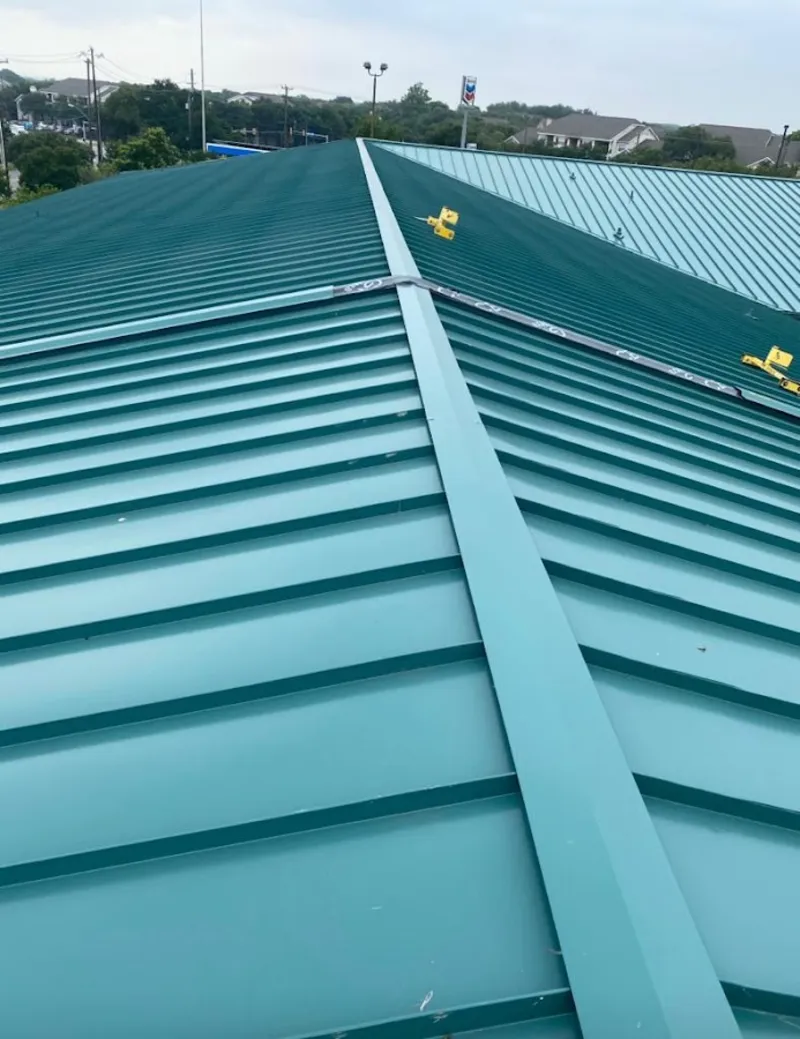 Green commercial metal roof ridge and valley for Metal Roof Repair in Chowchilla